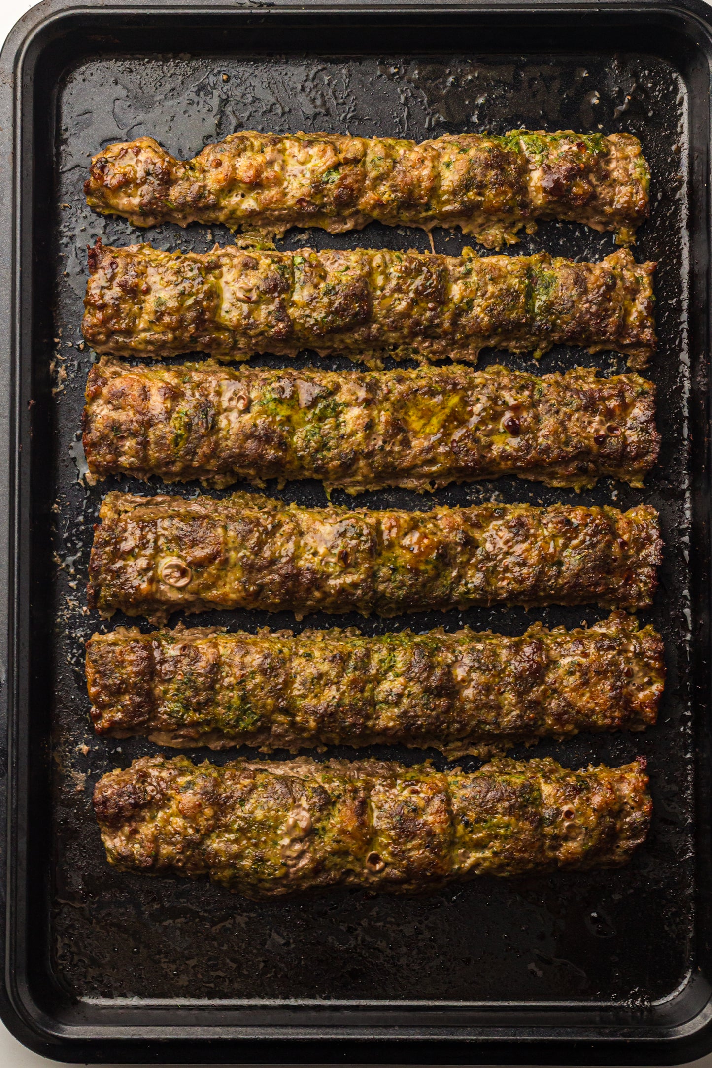 Sheet Pan Koftas with Tahini Dressing & Sumac Tomato-Cucumber Salad