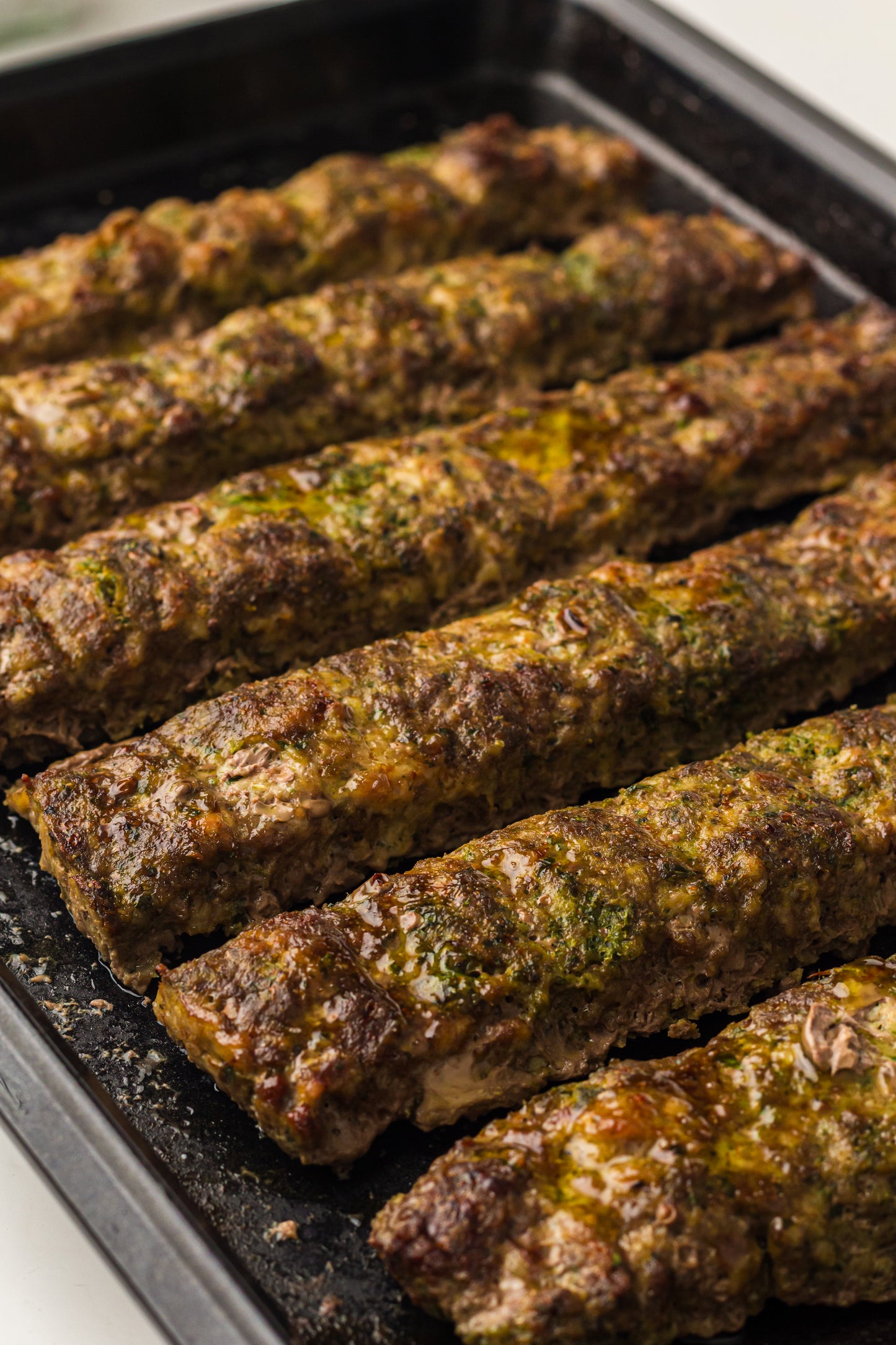 Sheet Pan Koftas with Tahini Dressing & Sumac Tomato-Cucumber Salad
