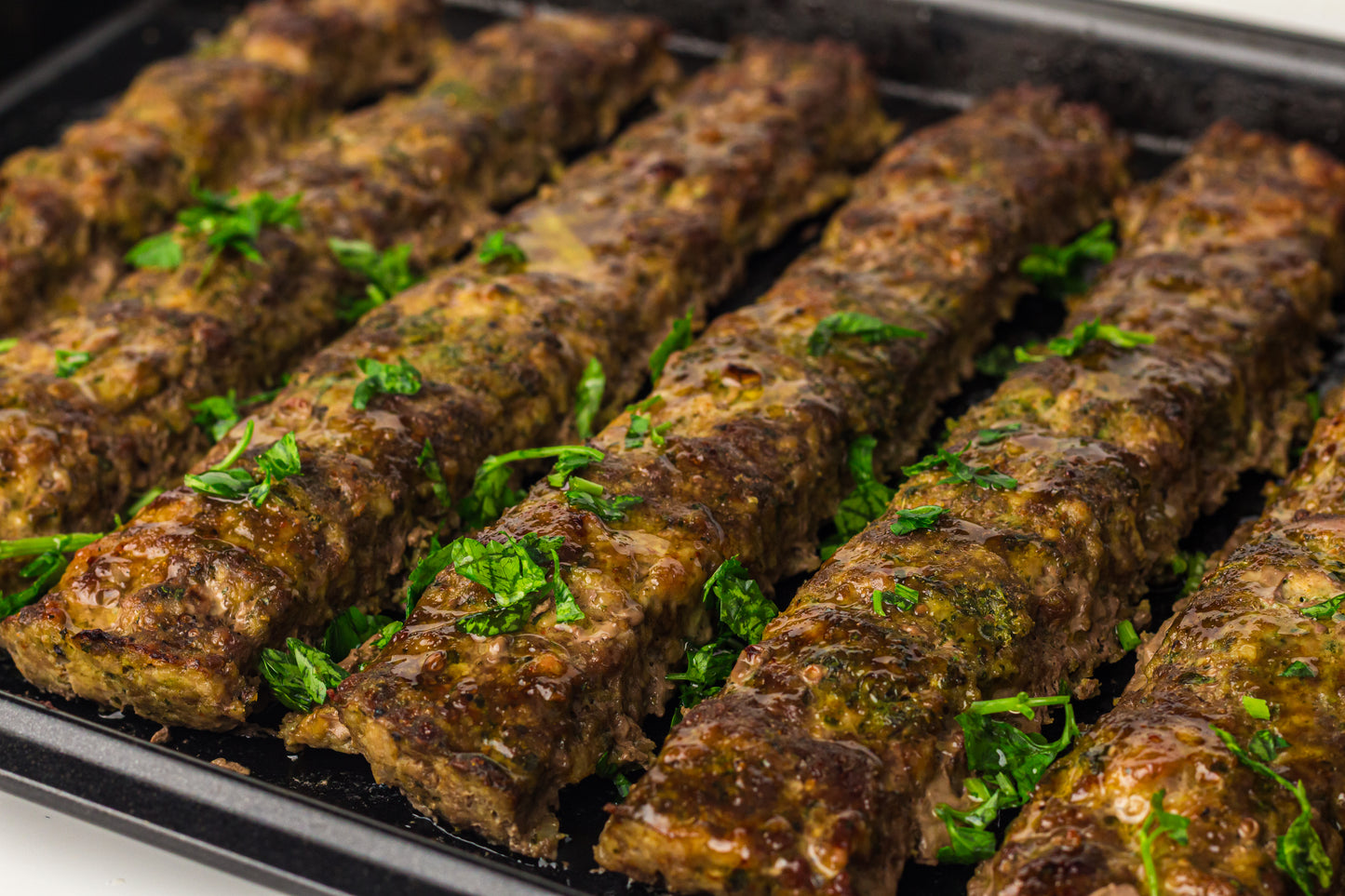 Sheet Pan Koftas with Tahini Dressing & Sumac Tomato-Cucumber Salad