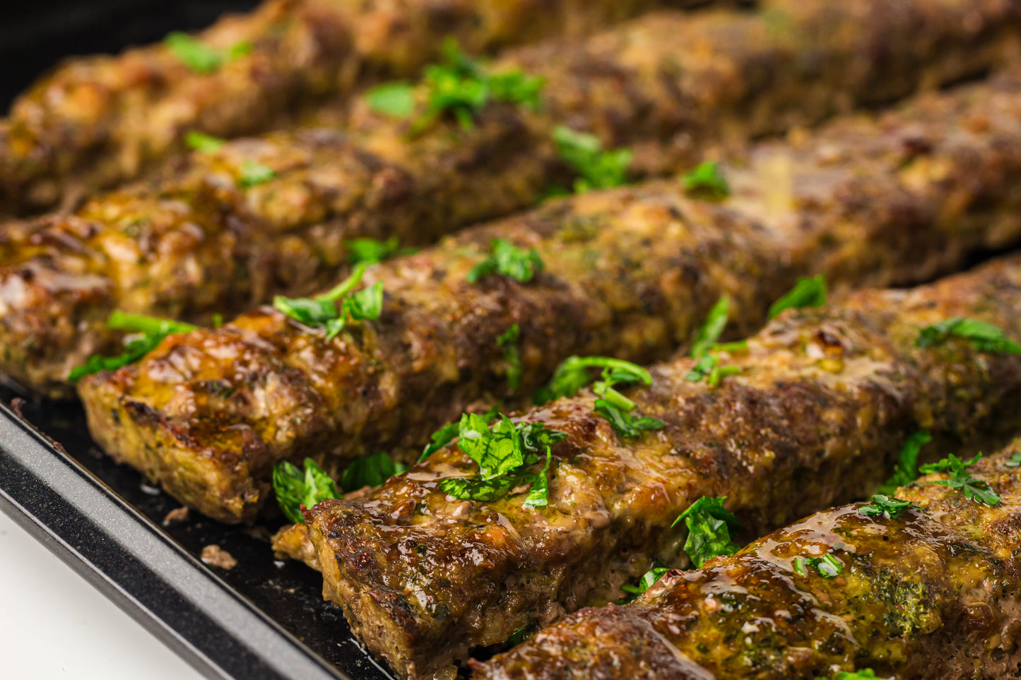 Sheet Pan Koftas with Tahini Dressing & Sumac Tomato-Cucumber Salad