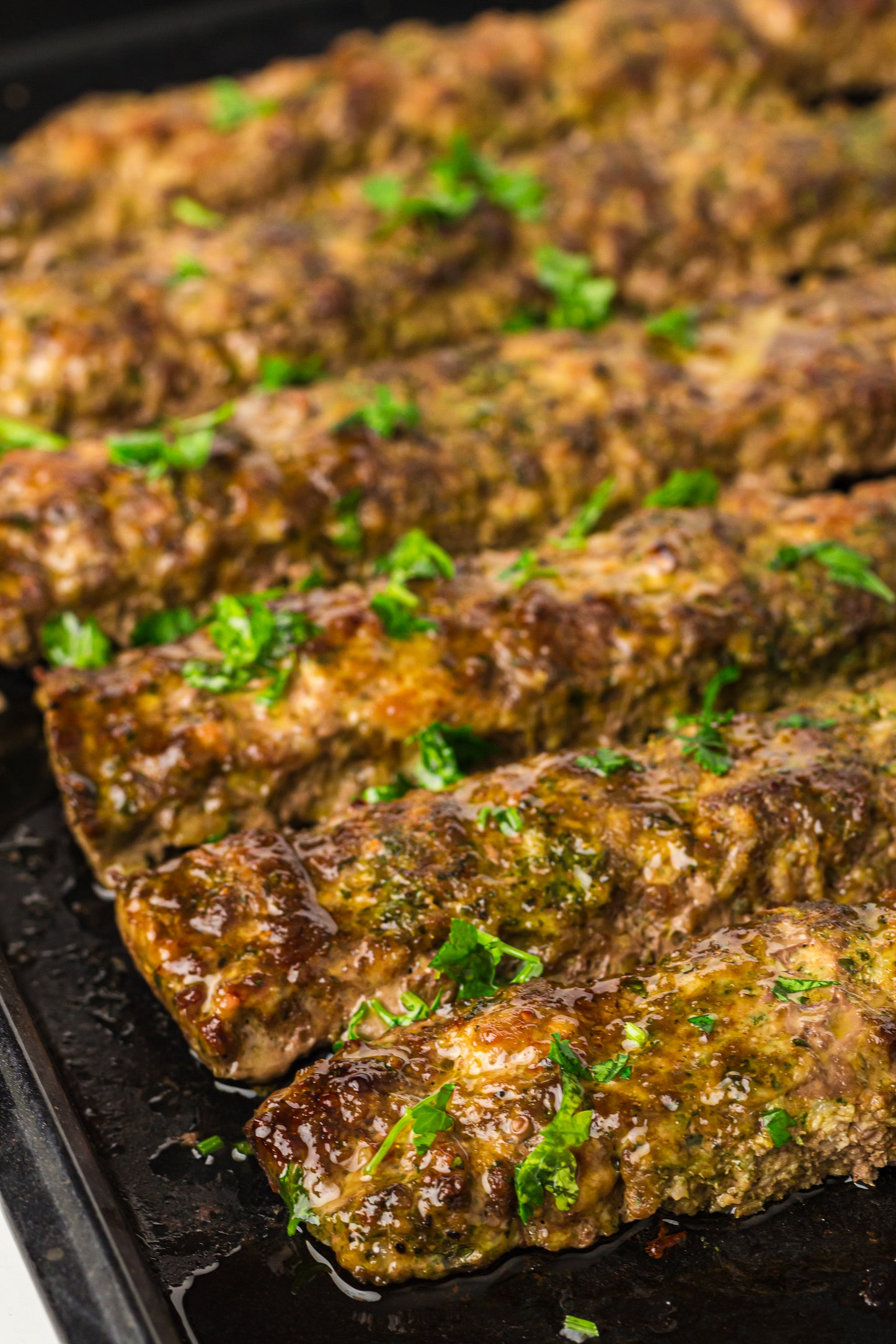 Sheet Pan Koftas with Tahini Dressing & Sumac Tomato-Cucumber Salad