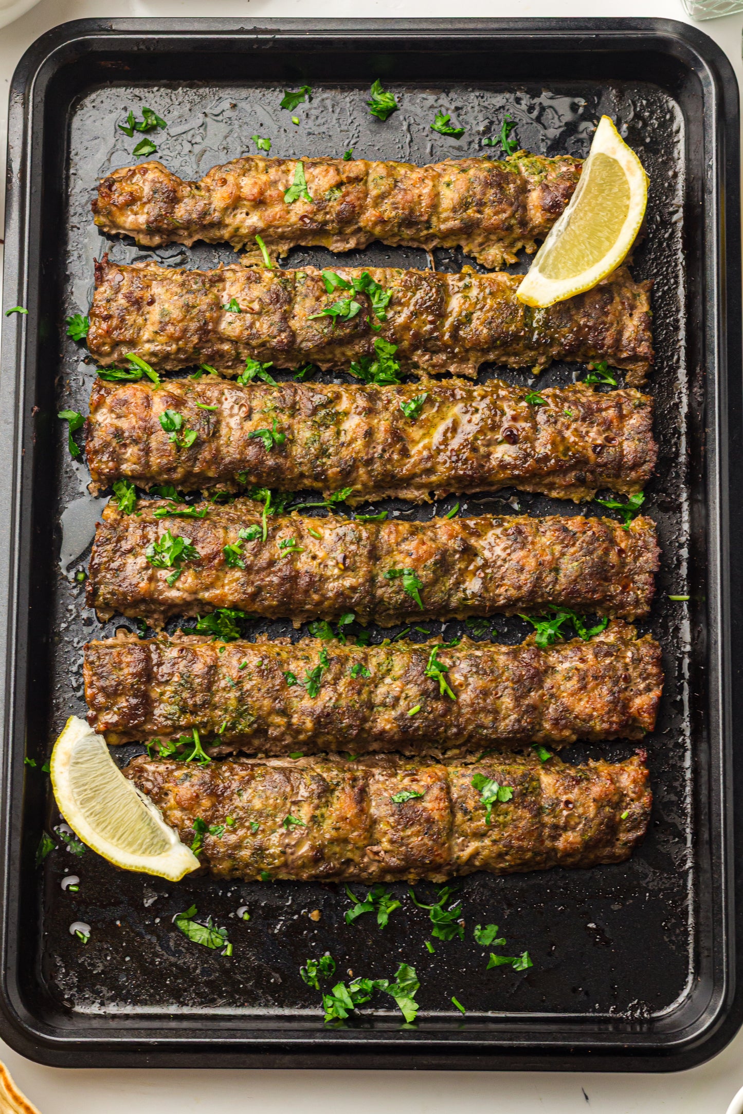 Sheet Pan Koftas with Tahini Dressing & Sumac Tomato-Cucumber Salad