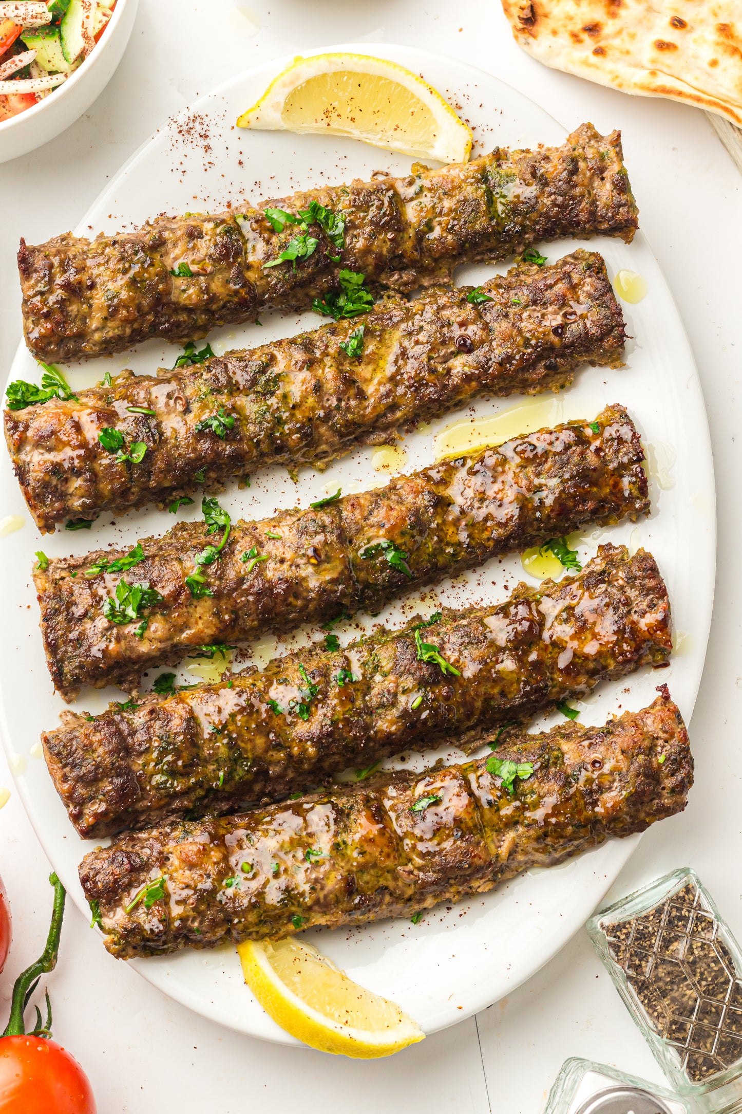 Sheet Pan Koftas with Tahini Dressing & Sumac Tomato-Cucumber Salad