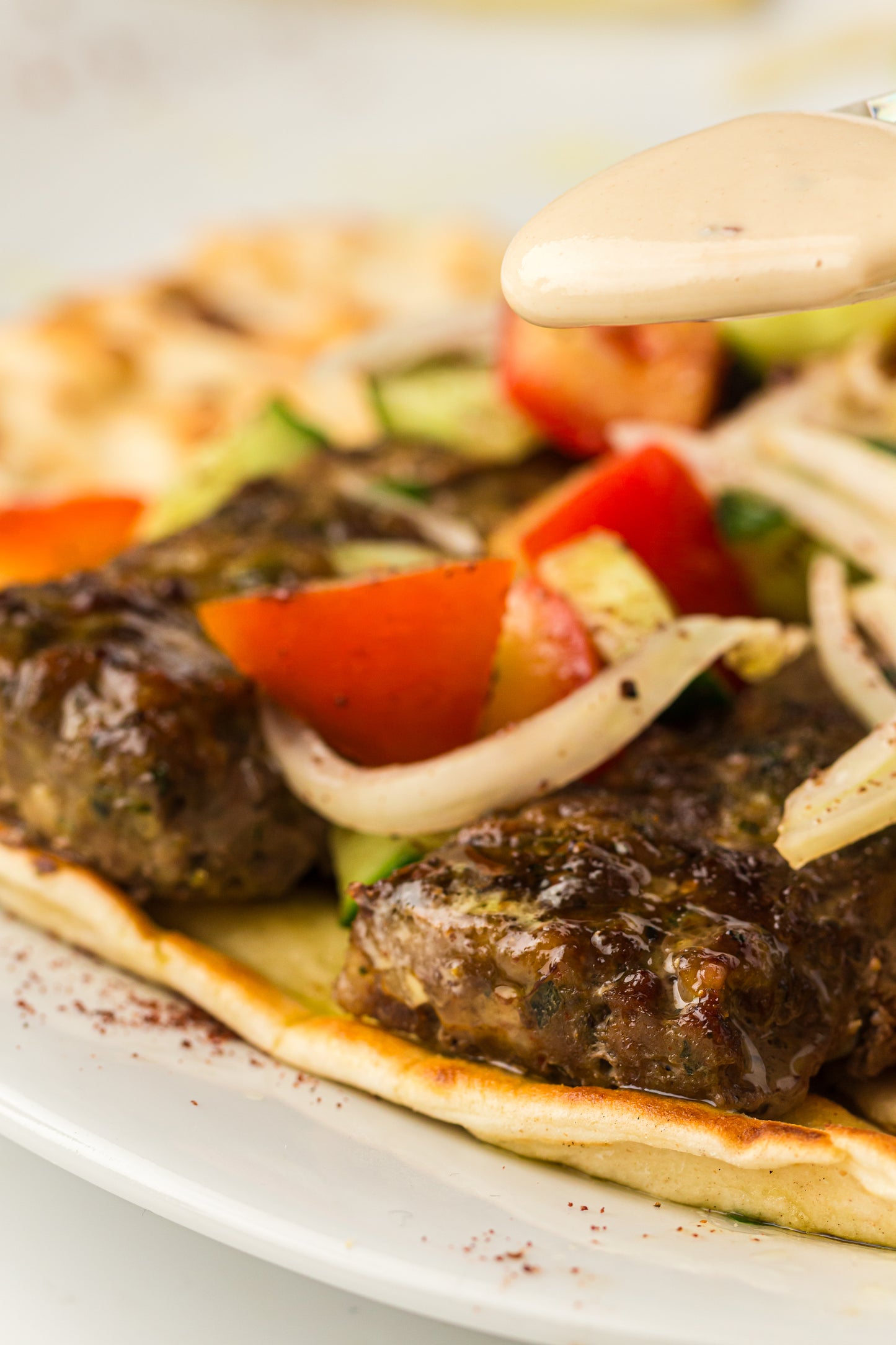 Sheet Pan Koftas with Tahini Dressing & Sumac Tomato-Cucumber Salad