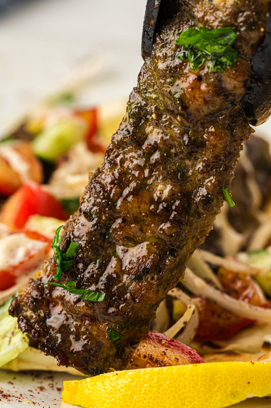 Sheet Pan Koftas with Tahini Dressing & Sumac Tomato-Cucumber Salad